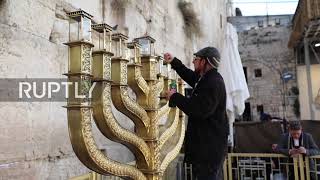 East Jerusalem: Lighting of Menorah near Western Wall marks start of Hanukkah