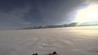 Снегоход Динго T125 по снегу с водой