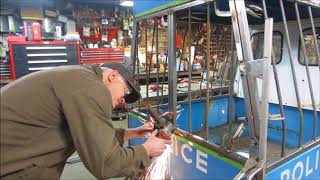 cushman meter maid, jail cell door hinge fabrication.