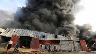 Food, aid destroyed in UN World Food Programme warehouse blaze