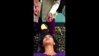 Dr. Carrick demonstrating cervical adjustment
