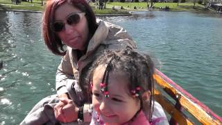 Artemis, Marco and Sara ride the swan boat