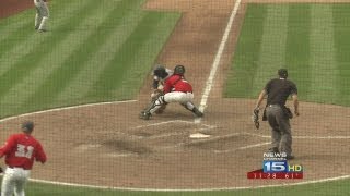 TinCaps catcher Rodney Daal hangs on during collision against Lake County to help Fort Wayne win gam