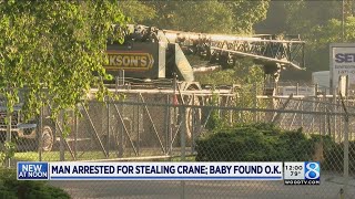 Man leaves baby, steals crane from Muskegon business