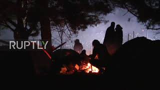 Belarus: Thousands of migrants spend night at makeshift camp on Polish border