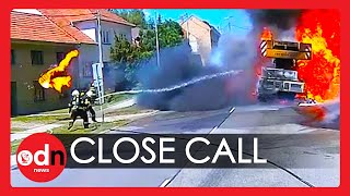 Moment Flaming Tyre Almost Hits Firefighters after Burning Crane Explodes