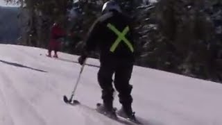 Double Amputee Disabled Canadian Vet skier 4 Tracks
