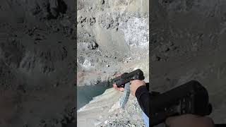 Full auto ak47 into frozen lake