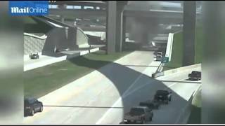 [Full] RAW Highway surveillance video 18-wheeler flies off highway on to road below