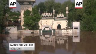 Landslides and flash floods triggered by heavy monsoon rains have killed nearly 300 people in large