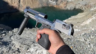 You can see the bullet go down from desert Eagle 50cal