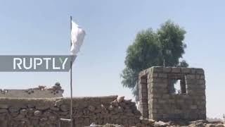 Afghanistan: Taliban flags on Kandahar buildings after reports of takeover