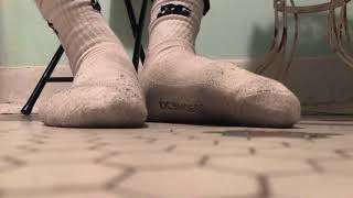 Unwinding in dirty white socks