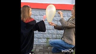 Spray of orange peel bursts on the ball  Брызг корки от апельсина лопает шарик