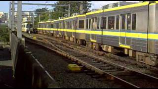 LRT Line 1 - 2nd Gen train leaving Central Terminal