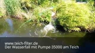 Der Wasserfall am Teich mit großer Teichpumpe