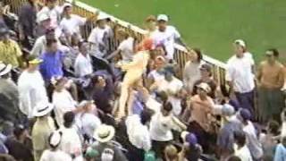 Inflatable woman bounced around cricket crowd