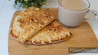 breakfast Bread ( misemen ) with milk tea
      ቑርሲ ቕጫ (ምሰመን) ምስ ጸባ ብ ሻሂ