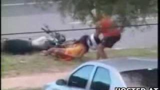 Motorcycle Dude Abuses Wife And Drags Her Away Caveman-Style - NothingToxic.com