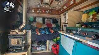 Solo Female works Corporate Job While living in a Converted Van home with a Cubic mini Wood Stove.