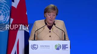 UK: Merkel urges world leaders to combat climate change during her final COP conference