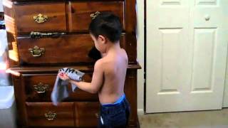 a 3 year old-Harlan put his clothes on