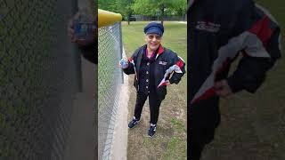 Nan and I watching Conner's t-ball game from the outfield "bleachers".