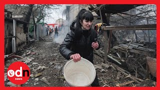 Ukrainians FLEE As Russian Tanks Roll In