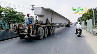 Tạm giữ 2 xe chở dầm cầu siêu trường không giấy phép vận chuyển