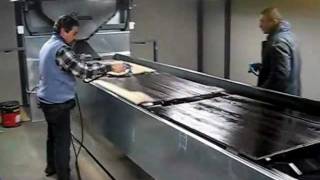 VIDALI IMPIANTI-VERNICIATURA MANUALE PARQUET SU CAROSELLO PRESSURIZZATO