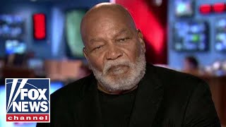 Jim Brown affirms support for Trump, national anthem