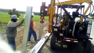 Highway guardrail installation/fixing machine ,pile driver working in Indonesia