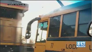 School Bus Gets Stuck Within Feet Of Passing Train