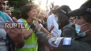 East Jerusalem: Activists scuffle with Israeli forces outside Sheikh Jarrah