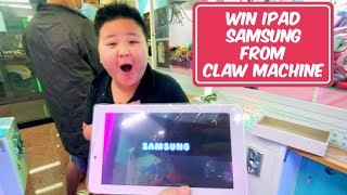 WIN IPAD FROM CLAW MACHINE