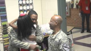 Father-and-son Fort Hood soldiers surprise family members at school.