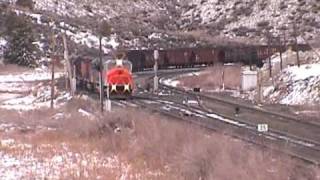 5000 hp of CAT. leads this Utah Railway train.