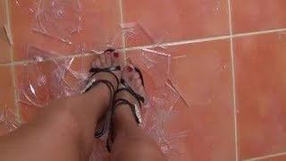 Trampling CD Cases In High Heel Sandals
