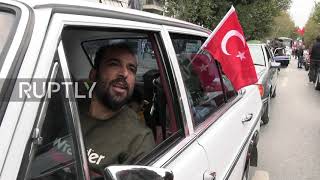 Patriotic cyclists and classic car owners parade through Istanbul on anniversary of Republic Day