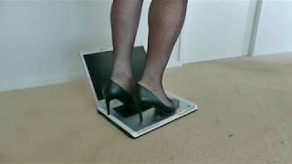 High Heels trample and crush a laptop