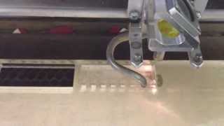 Cutting a laser power test strip