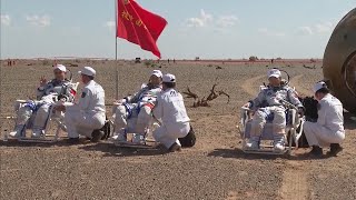 Shenzhou-12 astronauts after landing