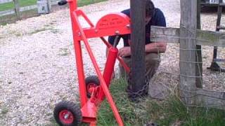 Pulling a steel gate post set in concrete