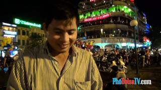 Anh Vượng bán dạo bò bía ngọt trên phố Đinh Tiên Hoàng, Hà Nội