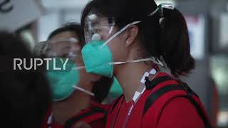 Japan: Chinese Olympic athletes arrive at Narita airport for Tokyo Games