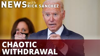 Biden stares down Congress, firm on withdrawal
