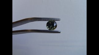 Faceting  montana  sapphire.