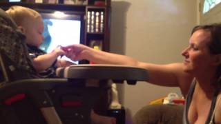 Ashton (1yo) being tickled on feet by Mom