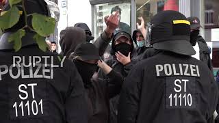 Germany: Opposing rallies face off as Merkel speaks at German Unity Day event in Halle