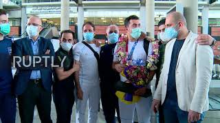 Iran: Olympic karate athlete Sajad Ganjazadeh brings gold medal home